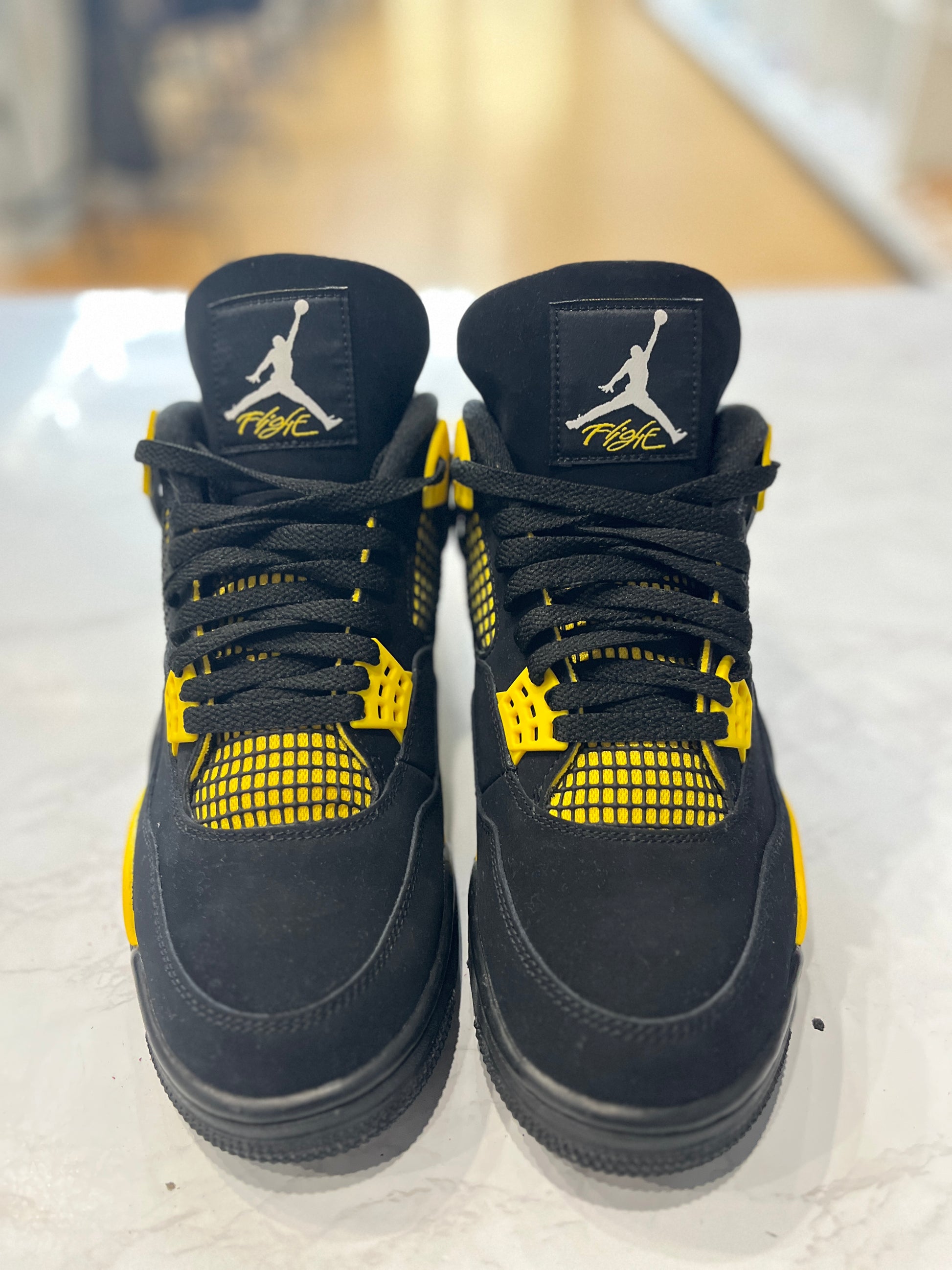 Jordan 4 Retro Thunder (2023) PRE-OWNED