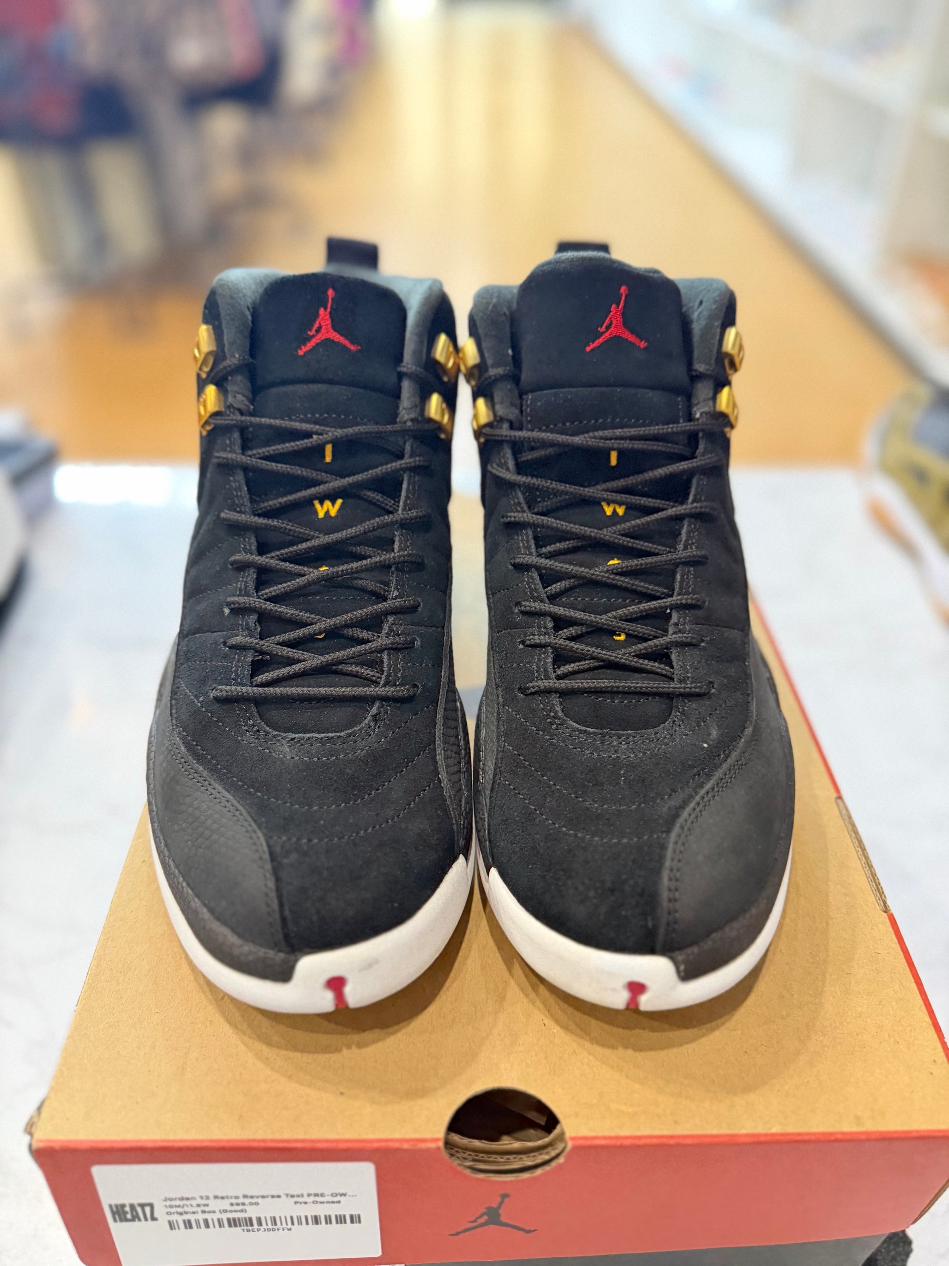 Jordan 12 Retro Reverse Taxi PRE-OWNED