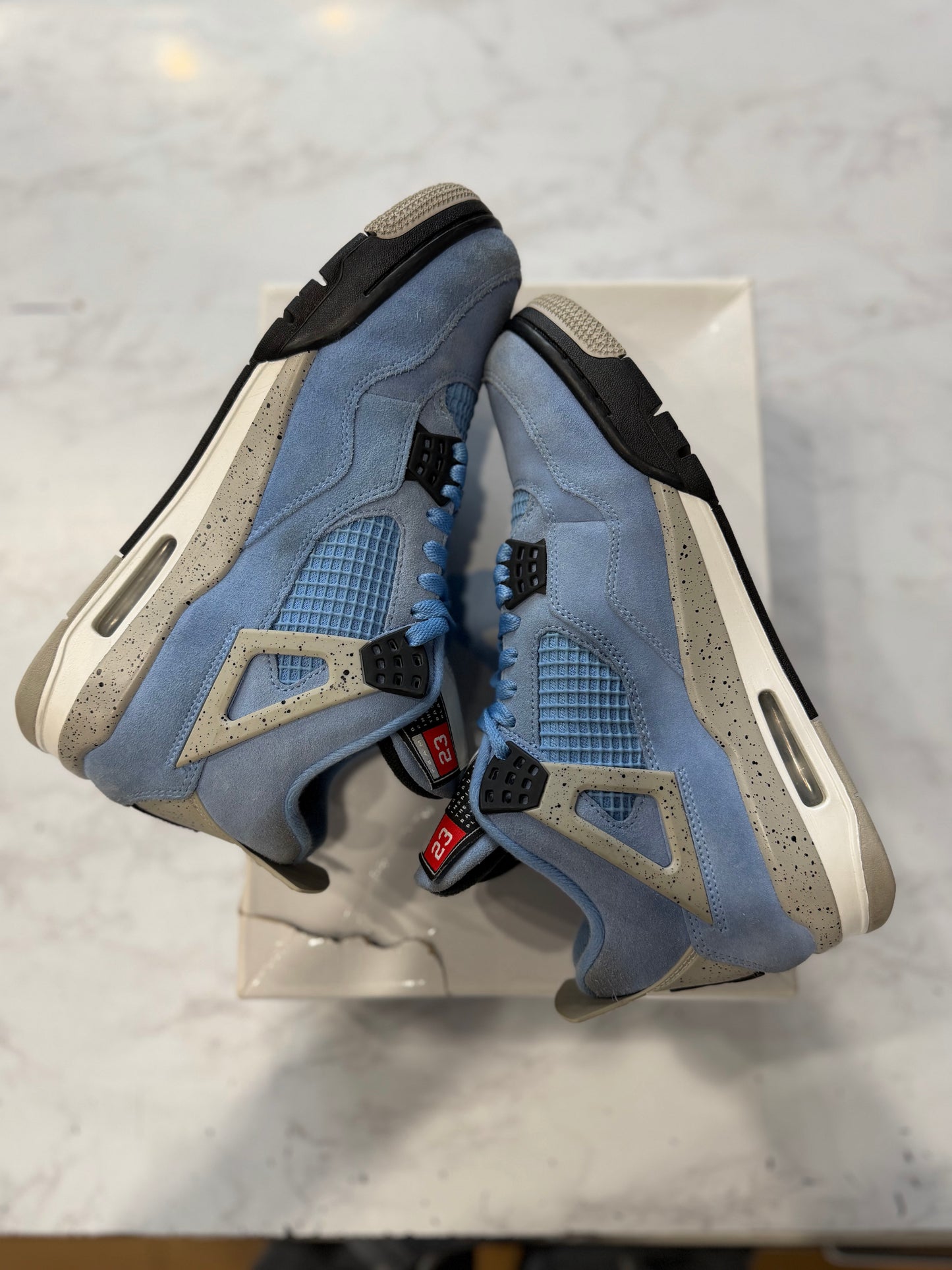 Jordan 4 Retro University Blue PRE-OWNED