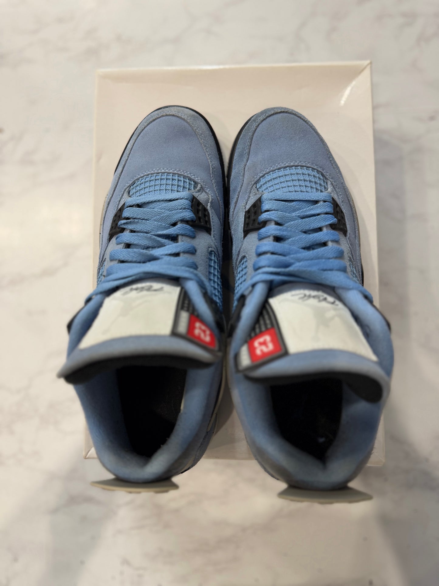 Jordan 4 Retro University Blue PRE-OWNED