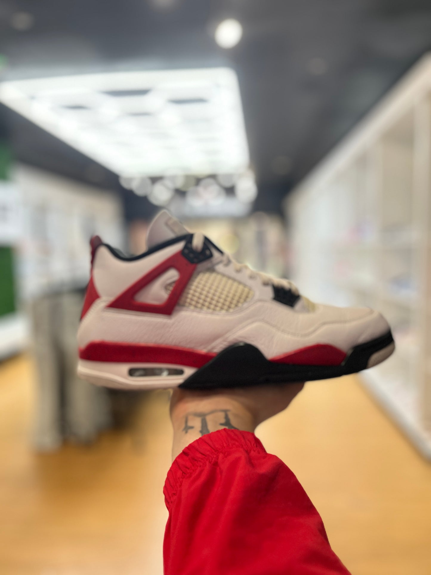 Jordan 4 Retro Red Cement PRE-OWNED