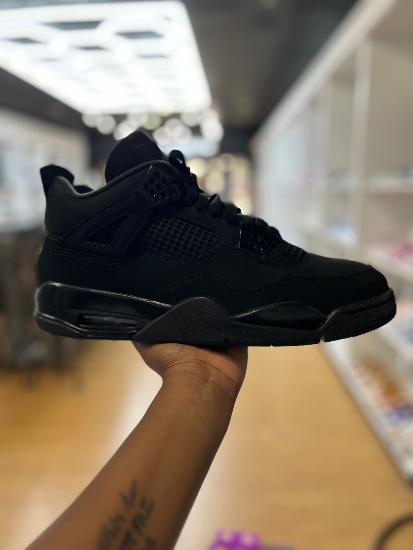 Jordan 4 Retro Black Cat (2025) PRE-OWNED