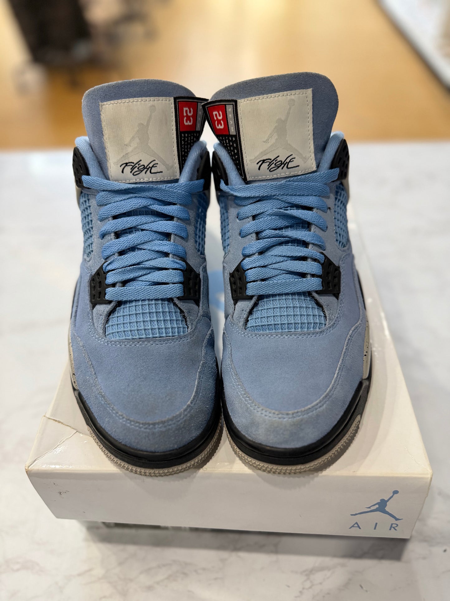 Jordan 4 Retro University Blue PRE-OWNED