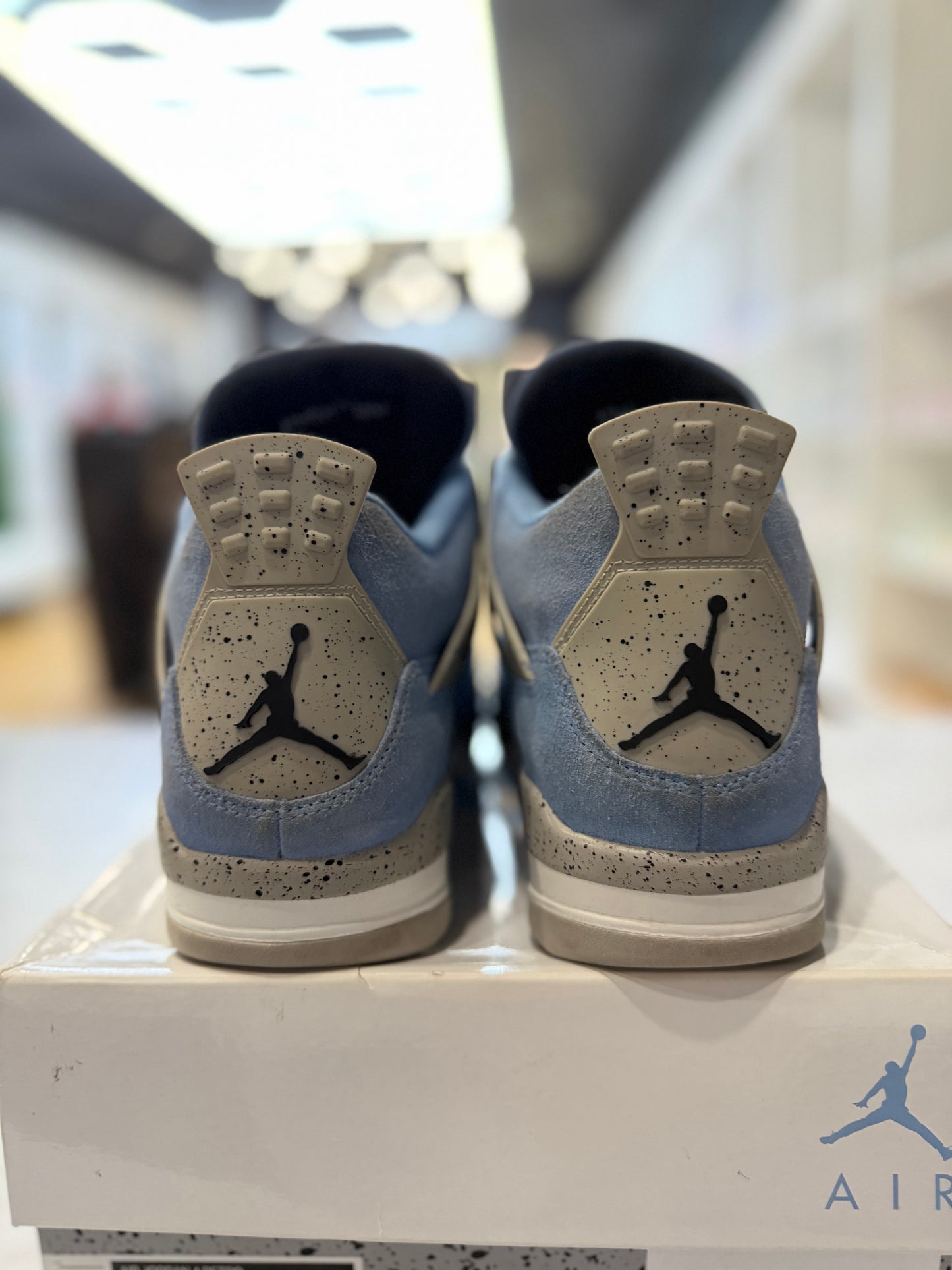 Jordan 4 Retro University Blue PRE-OWNED